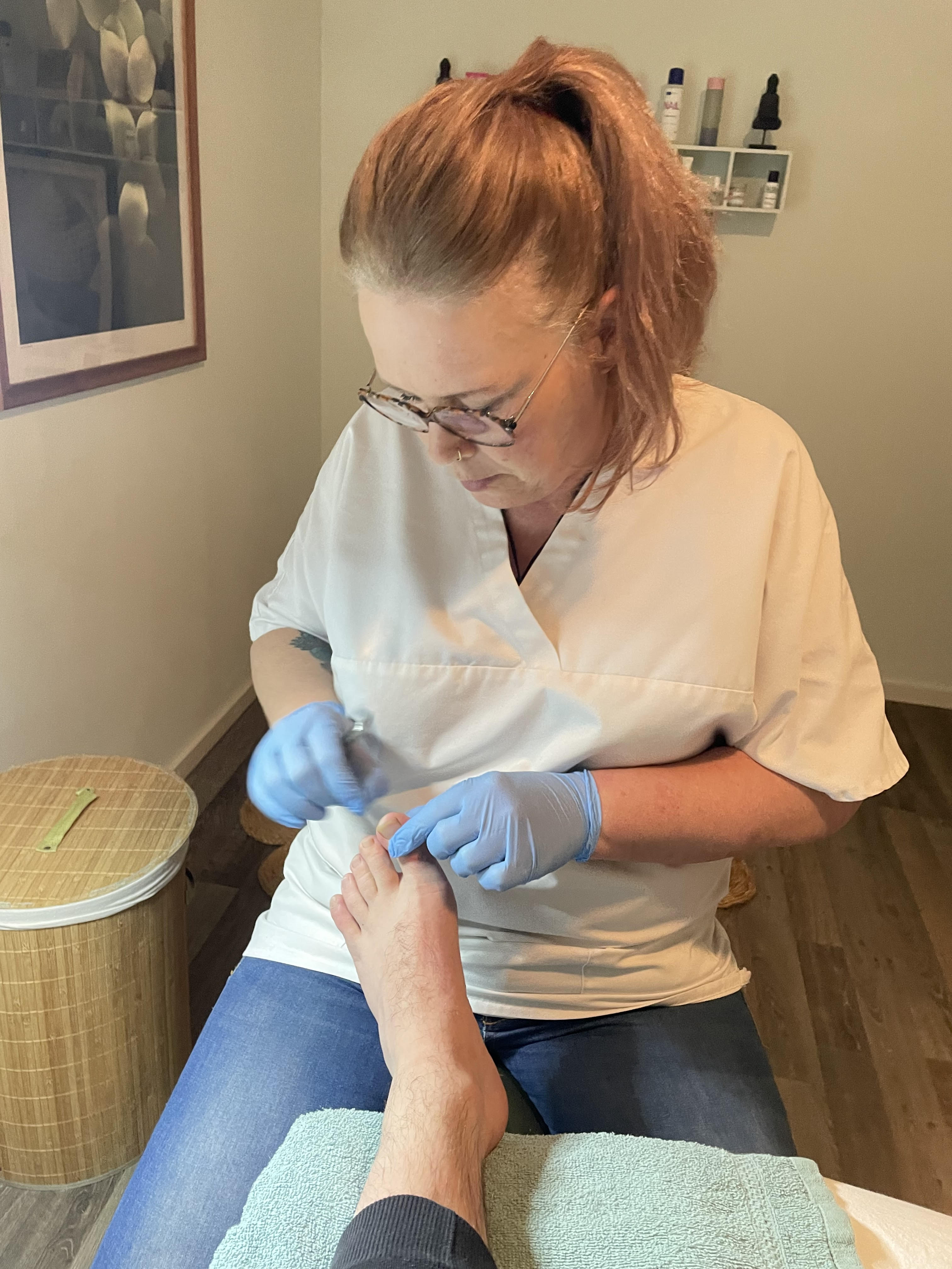 Portret van de pedicure specialist in de praktijk